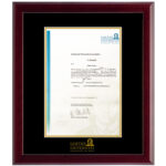 hanging certificates on wall